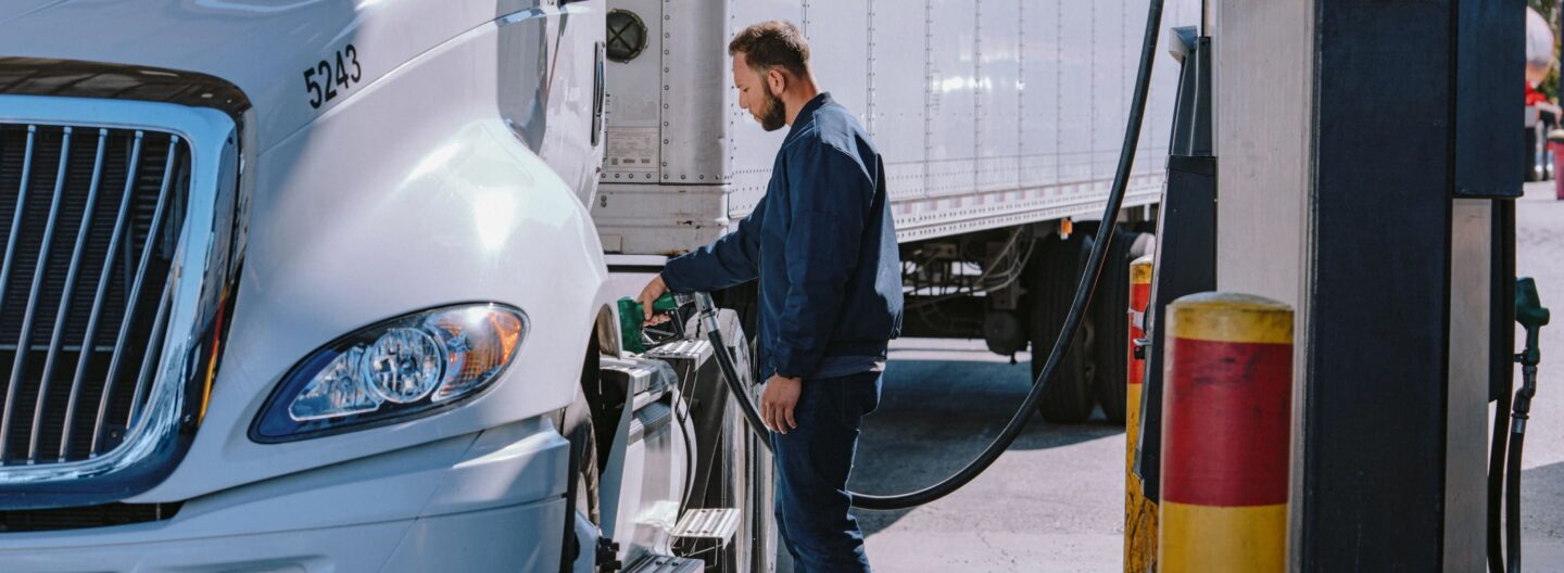 Credit Card - Hero Driver fueling gas at a gas station using Uber Freight’s carrier card